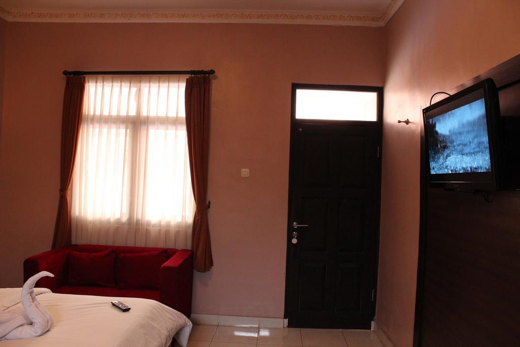 Puri Ganesh Hotel เลอกีอัน ภายนอก รูปภาพ